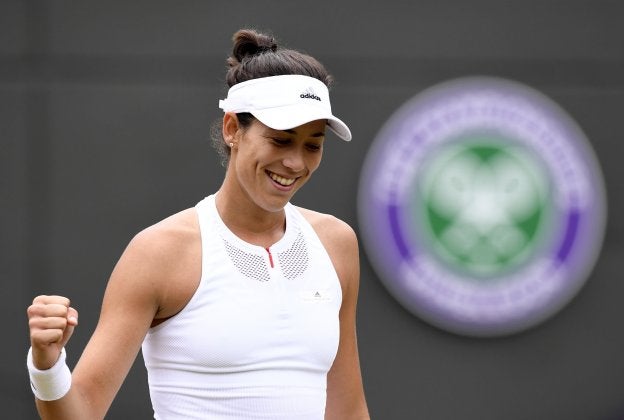 Garbiñe Muguruza celebra el triunfo ante Kuznetsova. :: efe