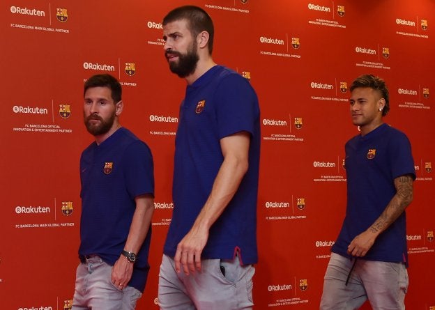 Leo Messi, Piqué y Neymar, en un acto publicitario del Barcelona. :: efe
