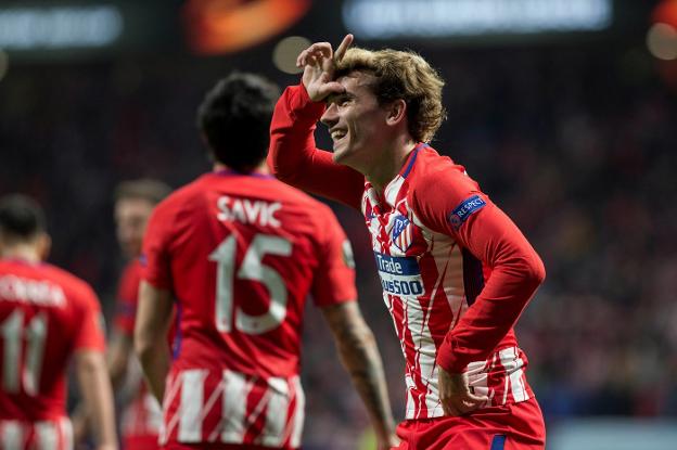 Antoine Griezmann celebra el segundo gol del Atlético al Sporting portugués en el Metropolitano. :: afp/